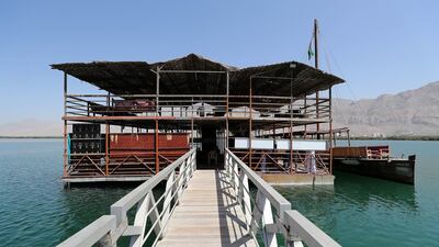 The Al Suwaidi pearl farm is reached via a short boat trip.
