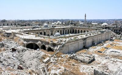 A picture taken on July 22, 2017 in the northern Syrian city of Aleppo, which was recaptured by government forces in December 2016, shows a general view of the destruction at the site of the ancient Grand Mosque in the old city. George Ourfalian / AFP