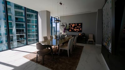A view of a dining room at one of the full-floor apartments at One Thousand Museum in Miami. AFP