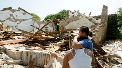 Women hug next to the rubble of a house in Union Hidalgo that was destroyed when an earthquake struck the Pacific coast of southern Mexico on September 7, 2017. Jorge Luis Plata / Reuters