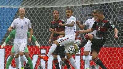 Germany's Toni Kroos is challenged by Fabian Johnson,left, of the US during their match on Thursday at the 2014 World Cup in Recife, Brazil. Brian Snyder / Reuters
