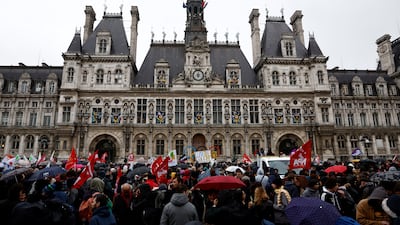 Protesters gather in front of the Paris City Hall after the Constitutional Council approved most of the French government's pension reform, on Friday. Reuters