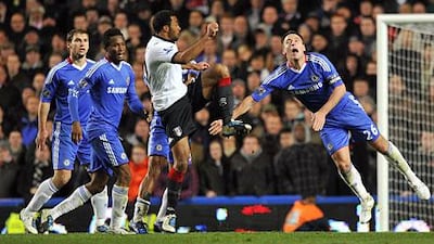 Chelsea's defender John Terry, right, vies with Fulham's striker Moussa Dembele, 2nd right.