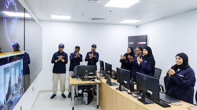 Members of the National Space Science and Technology Centre (NSSTC) at the United Arab Emirates University celebrate the successful launch. Photo: Wam