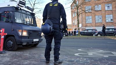 A police officer outside the mosque. AFP