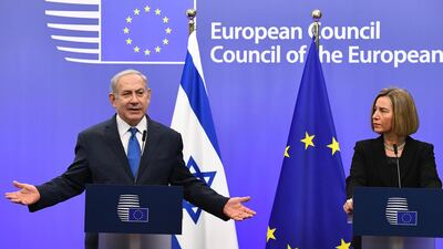 Israel's premier Benjamin Netanyahu and EU foreign policy chief Federica Mogherini speak during a joint press conference at the European Council in Brussels on December 11, 2017. Emmanuel Dunand / AFP