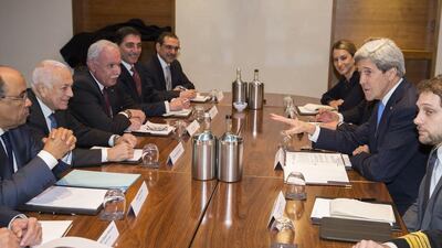 The US secretary of state John Kerry, second right, meets Arab League secretary general Nabil Al Araby, second from left, in London on December 16, 2014, to discuss the peace process between the Israelis and Palestinians. Evan Vucci / AP Photo