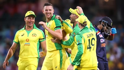 Australia’s Josh Hazlewood celebrates with teammates after taking the wicket of India’s Shreyas Iyer at the Sydney Cricket Ground. AFP