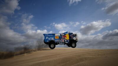 Kamaz' Russian driver Andrey Karginov, co-driver Andrey Mokeev and Igor Lenonov in action. AFP