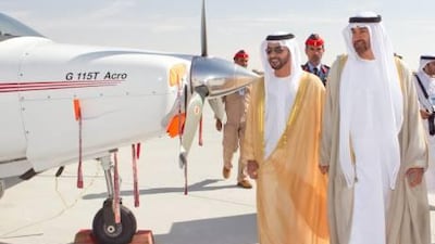 Sheikh Mohammed bin Zayed, centre, Crown Prince of Abu Dhabi and Deputy Supreme Commander of the UAE Armed Forces, and Sheikh Hamdan bin Zayed, the Ruler's Representative for the Western Region, attend the inauguration of the Liwa Airbase at Madinat Zayed in the Western Region.
