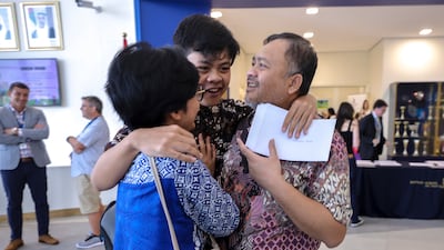 Wahyu Wijaksono celebrates with his parents
