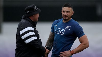 New Zealand head coach Steve Hansen, left, talks with Sonny Bill Williams. Getty
