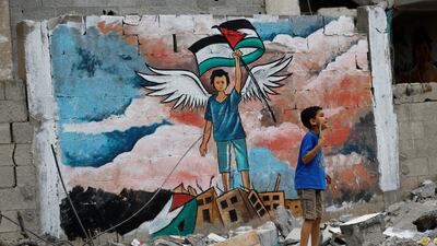 A mural on the remains of a house destroyed in an Israeli strike. Reuters