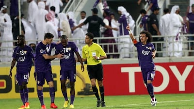 Omar Abdulrahman celebrates after scoring the opening goal. Karim Jaafar / AFP