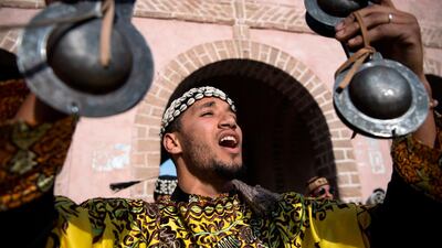 A Gnawa traditional group performs in the city of Essaouira to celebrate the decision to add the Gnawa culture to Unesco's list of Intangible Cultural Heritage of Humanity. AFP