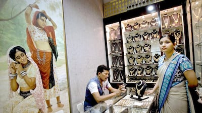 Recovering demand in China and India are expected to help to raise gold price to $1,400 per ounce by the end of the year. Kamran Jebreili / AP Photo
