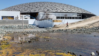 From April 2016: The first four stages of "flooding" the construction site starts. The process involved welcoming back water from the Arabian Gulf, which surrounds the museum today. Christopher Pike / The National