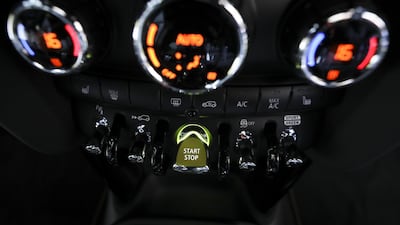 The ignition start/stop switch. Bloomberg