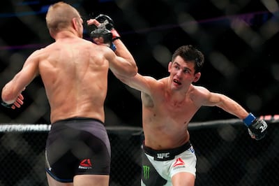 Dominick Cruz throws a right during his victory against TJ Dillashaw at UFC Fight Night 81 in Boston in 2016. AP