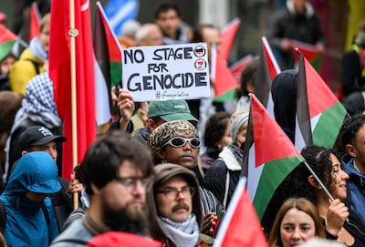 Participants waving Palestinian flags protest Israel's participation at the Eurovision Song Contest in Vienna. AFP