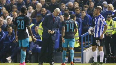 Arsenal's Theo Walcott comes off the pitch after getting injured in the team's loss to Sheffield Wednesday in the League Cup on Tuesday night. Jason Cairnduff / Action Images / Reuters / October 27, 2015
