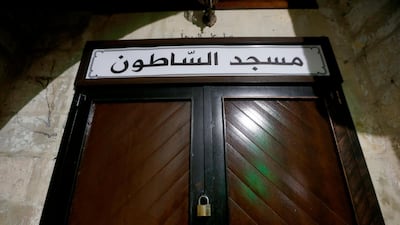 A closed door after the last prayer at Al-Satoun Mosque in the Old City of Nablus. The Palestinian Authority closed all mosques and churches in the West Bank and asked Palestinians to pray at home to prevent the spread of the coronavirus. EPA