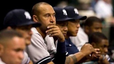 An 0-3 start to the season has Derek Jeter, centre, and the rest of the New York Yankees a bit glum.