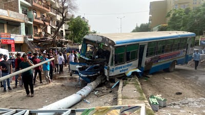 A bus crashed into a pole after its brakes failed in the Indian city of Gurugram. Getty Images