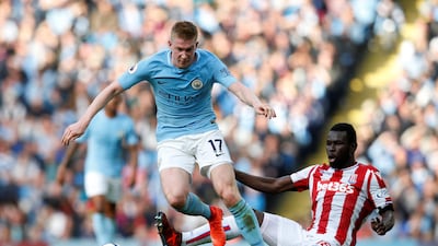 Manchester City's Kevin de Bruyne, left, was instrumental in his side's 7-2 win over Stoke City. Andrew Yates / Reuters
