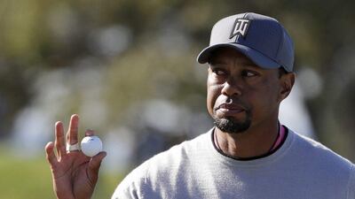 Tiger Woods reacts to the crowd after finishing the 11th hole of the North Course during the second round of the Farmers Insurance Open golf tournament Friday, Jan. 27, 2017, at Torrey Pines Golf Course in San Diego. Gregory Bull / AP Photo