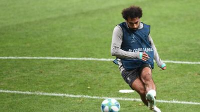 Liverpool's Egyptian midfielder Mohamed Salah kicks the ball during a training session ahead of the UEFA Super Cup 2019 match between Liverpool and Chelsea at Besiktas Park stadium in Istanbul. AFP