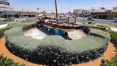 A traditional sailing vessel in the middle of a Ras Al Khaimah roundabout.