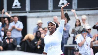 Serena Williams waves to the crowd after her first round win against Camila Giorgi. Getty Images