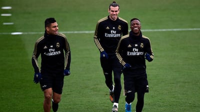 Real Madrid's Casemiro, Vinicius Junior and Gareth Bale attend a training session. AFP