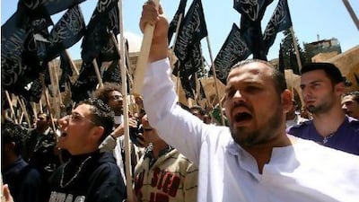 Supporters of Hizb ut Tahrir protest against the Syrian regime in the northern Lebanese city of Tripoli on April 22.