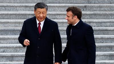 President Xi and President Macron at the Great Hall of the People in Beijing on Thursday. AFP