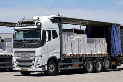 Lorries carrying aid wait to enter the Gaza Strip from Israel's Kerem Shalom crossing on Tuesday. AFP