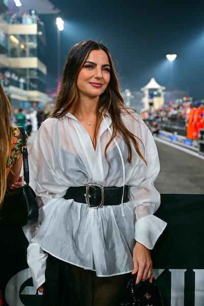 Kelly Piquet walking through the paddock ahead of Sunday’s race. AFP