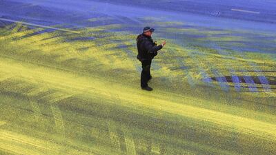 A police officer on the painted road