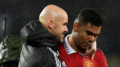 Manchester United manager Erik ten Hag and Casemiro (R) after the final whistle. AFP