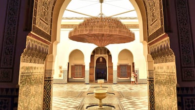 The main courtyard of the Marrakech Museum is dominated by an enormous, oval-shaped wooden lamp. Photo: Ronan O’Connell
