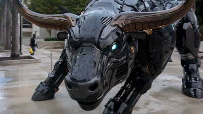 The robo-crypto bull statue on the campus of the Miami Dade College Wolfson campus in Miami, Florida. AFP
