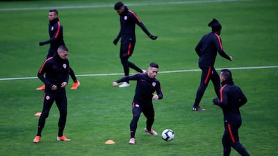 Chile's Oscar Opazo practices dribbling skills. Reuters
