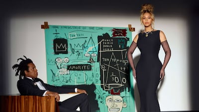 Beyonce and Jay-Z pose in front of Jean-Michel Basquiat's 'Equals Pi', a work from 1982. Photo: Tiffany & Co