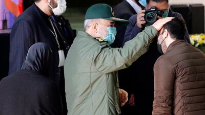 Iranian revolutionary guards corps (IRGC) chief Hossein Salami greets Soleimani's son during a ceremony on the occasion of first anniversary of death of late Iranian Revolutionary Guards Corps (IRGC) Lieutenant general and commander of the Quds Force Qasem Soleimani in Tehran, Iran. EPA