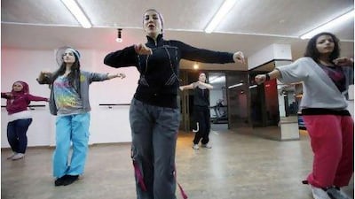 Huda Bahri, above, this year introduced modern dances to several gyms in Jordan.