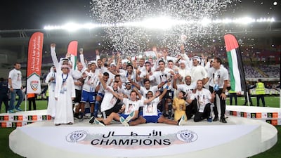 Members of Al Nasr celebrate defeating Al Ahli during the President’s Cup final match at Hazza bin Zayed stadium in Al Ain on June 3, 2015. Christopher Pike / The National