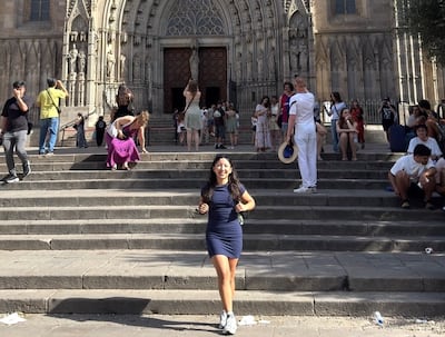 Cynthia Aceituno, who moved to Spain, is pictured outside Barcelona Cathedral in the Gothic Quarter of the city. Photo: Courtesy of Cynthia Aceituno