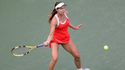 Danielle Collins of the United States returns a volley in her Women's Singles first round match against Anett Kontaveit of Estonia. AFP