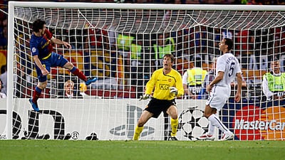 Lionel Messi, left, heads in Barcelona's second goal as Rio Ferdinand looks on to seal a 2-0 triumph against Manchester United in the 2009 Champions League final in Rome.